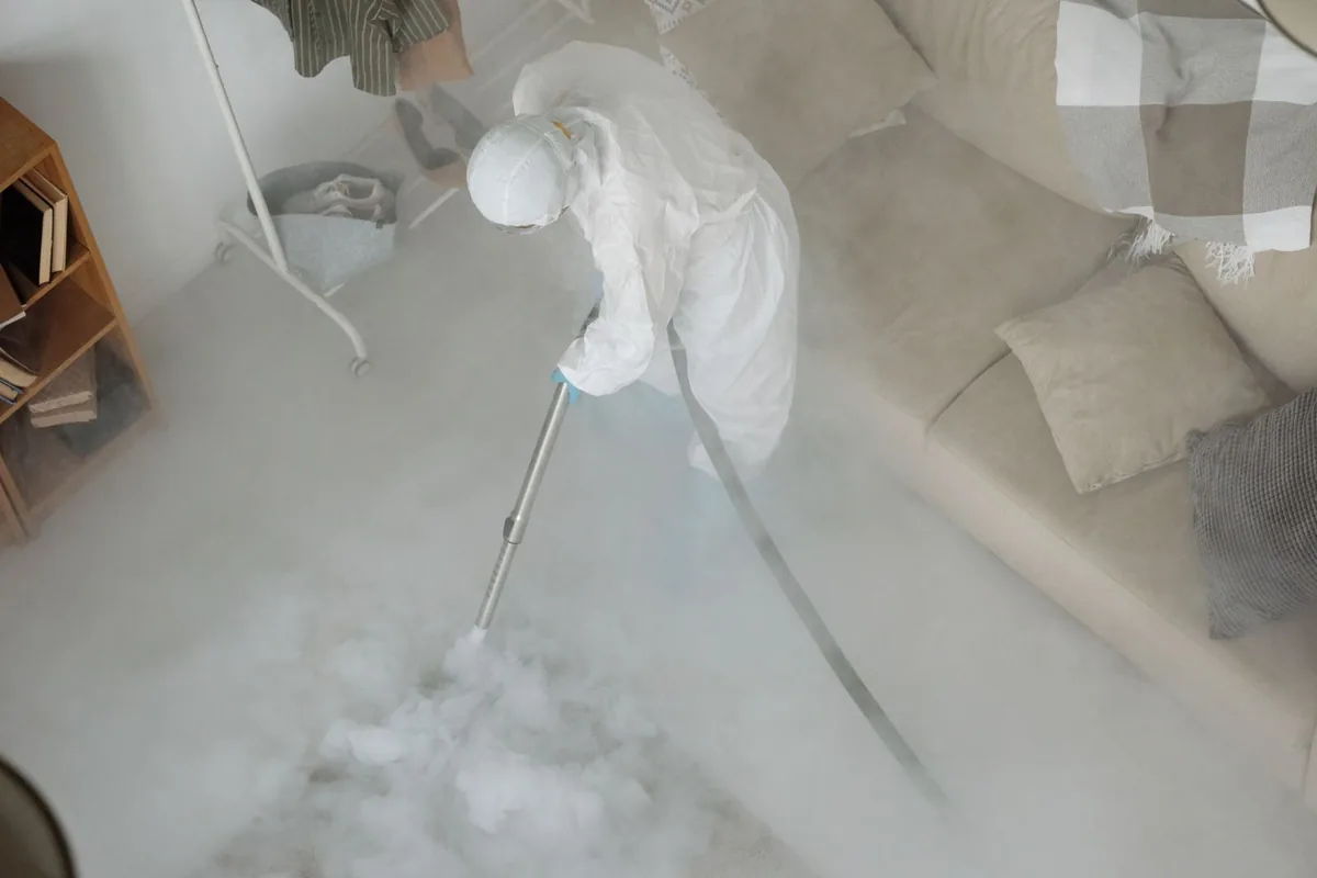Biohazard cleanup technician in protective equipment, Temescal Valley, CA
